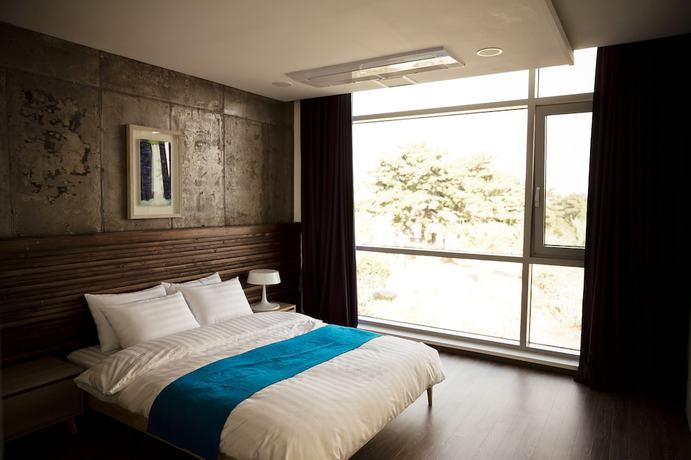 Imagen de la habitación del Hotel Color in Jeju. Foto 17