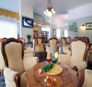 Imagen del bar/restaurante del Hotel Colorado, Lignano Sabbiadoro. Foto 2