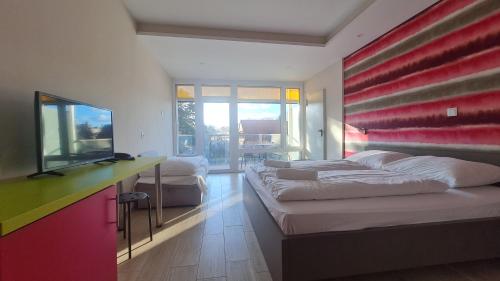 Imagen de la habitación del Hotel Colors Holiday. Foto 16