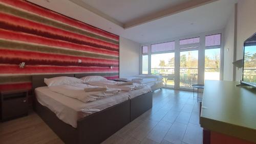 Imagen de la habitación del Hotel Colors Holiday. Foto 17