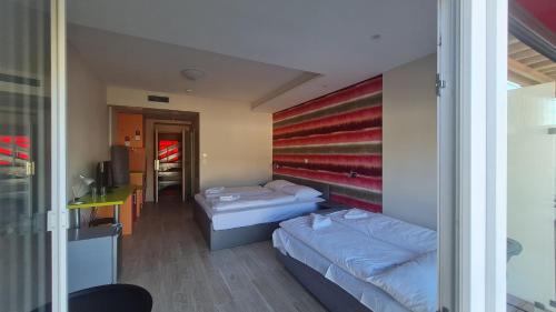 Imagen de la habitación del Hotel Colors Holiday. Foto 19