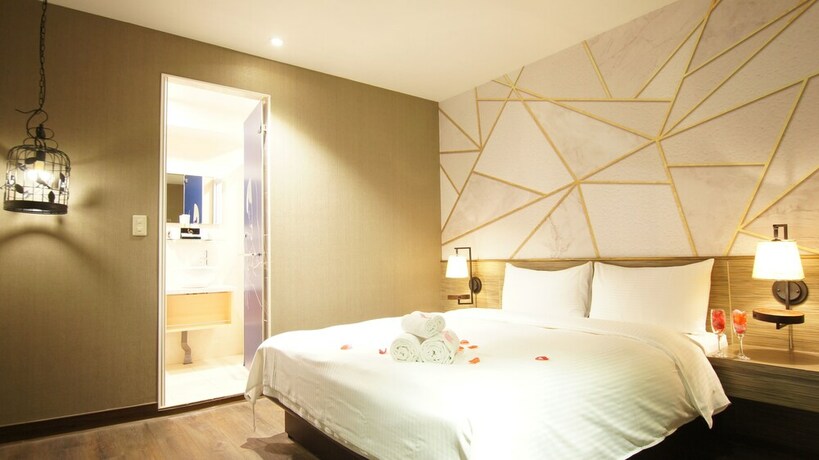 Imagen de la habitación del Hotel Colors Infinity Inn. Foto 26