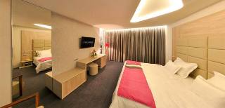 Imagen de la habitación del Hotel Colors Inn. Foto 5