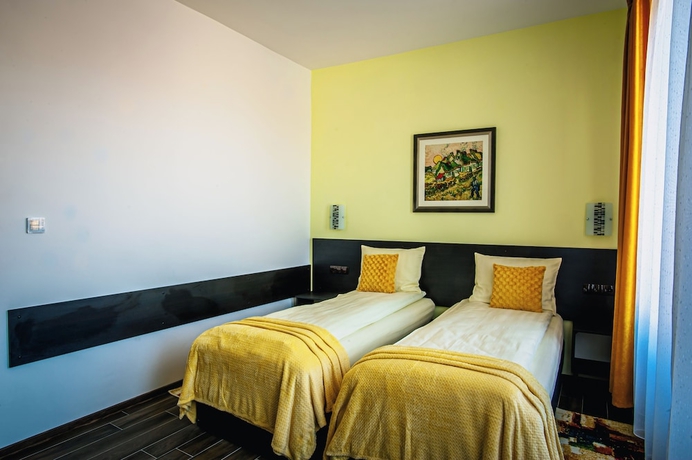 Imagen de la habitación del Hotel Colors Residence. Foto 12