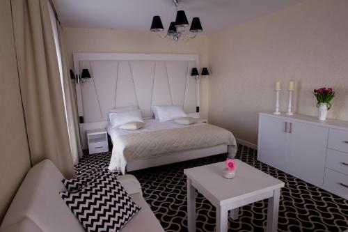 Imagen de la habitación del Hotel Coloseum. Foto 8