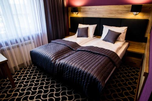 Imagen de la habitación del Hotel Coloseum. Foto 9