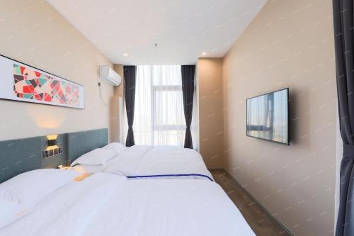 Imagen de la habitación del Hotel Colour - Nanchang West Railway Station. Foto 18