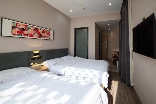Imagen general del Hotel Colour - Nanchang West Railway Station. Foto 11