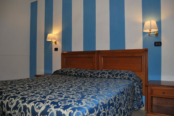 Imagen de la habitación del Hotel Coluccini. Foto 8