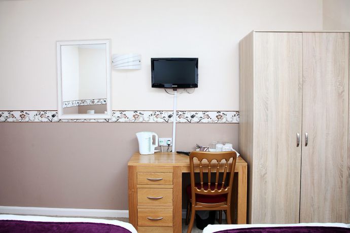 Imagen de la habitación del Hotel Columbia and Restaurant. Foto 3