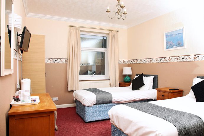 Imagen de la habitación del Hotel Columbia and Restaurant. Foto 6