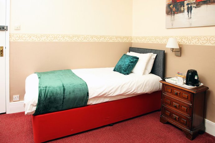 Imagen de la habitación del Hotel Columbia and Restaurant. Foto 7