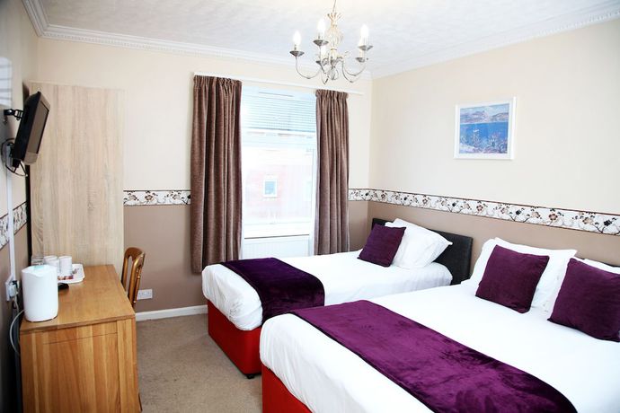 Imagen de la habitación del Hotel Columbia and Restaurant. Foto 8