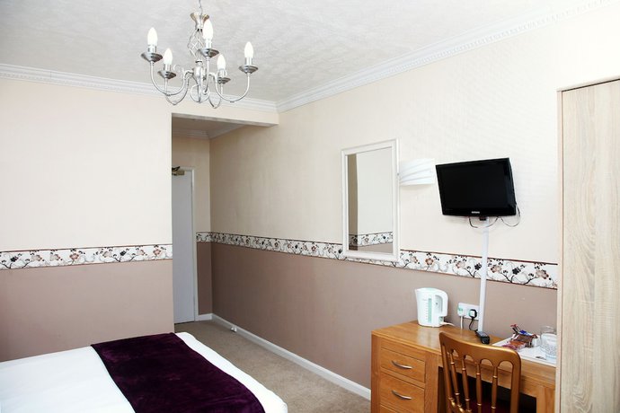 Imagen de la habitación del Hotel Columbia and Restaurant. Foto 10