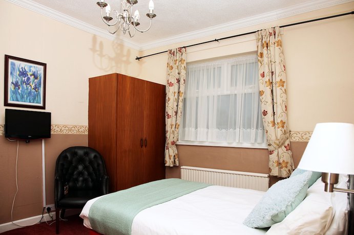 Imagen de la habitación del Hotel Columbia and Restaurant. Foto 11