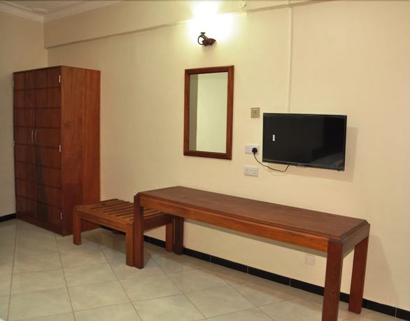 Imagen de la habitación del Hotel Com Apartment. Foto 2