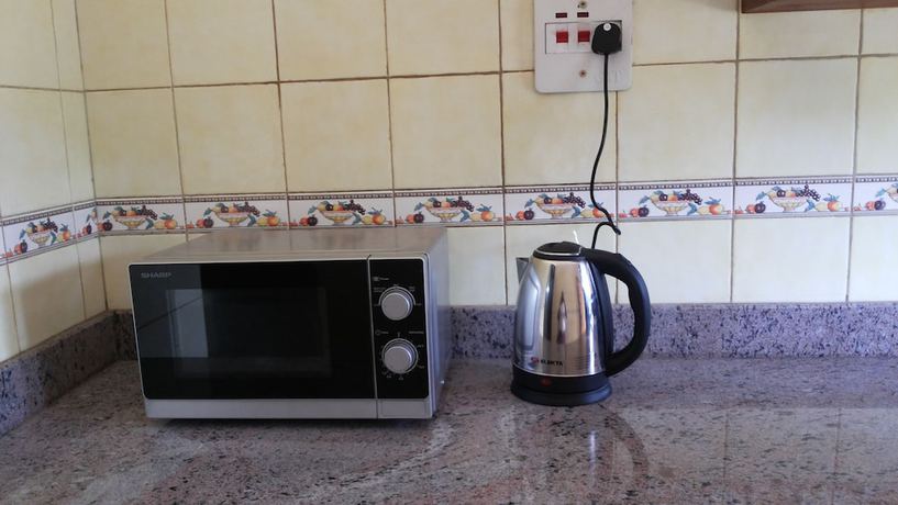 Imagen de la habitación del Hotel Com Apartment. Foto 3