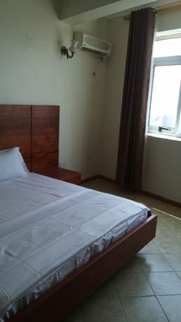 Imagen de la habitación del Hotel Com Apartment. Foto 4