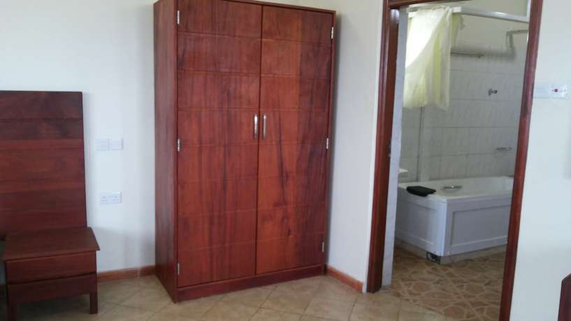 Imagen de la habitación del Hotel Com Apartment. Foto 5