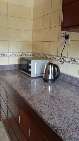Imagen de la habitación del Hotel Com Apartment. Foto 8