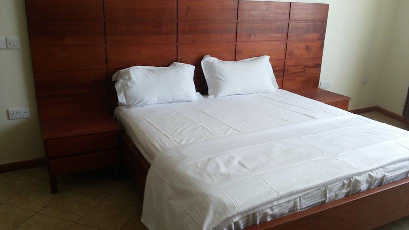 Imagen de la habitación del Hotel Com Apartment. Foto 13