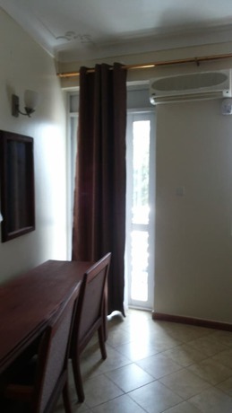 Imagen de la habitación del Hotel Com Apartment. Foto 14