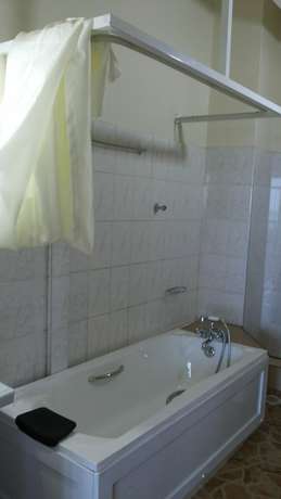 Imagen de la habitación del Hotel Com Apartment. Foto 15