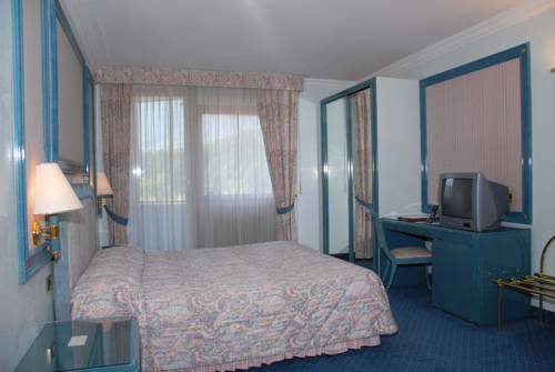 Imagen de la habitación del Hotel Comano Cattoni Holiday. Foto 10