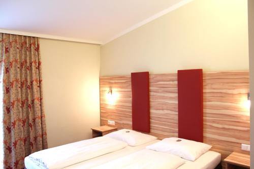Imagen de la habitación del Hotel Come IN. Foto 8