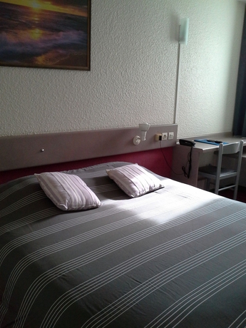 Imagen de la habitación del Hotel Come Inn. Foto 3