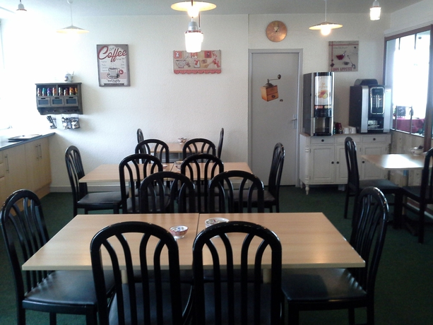 Imagen del bar/restaurante del Hotel Come Inn. Foto 2