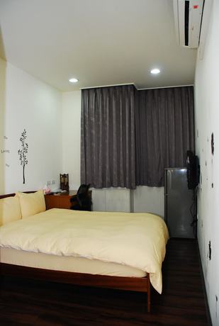Imagen de la habitación del Hotel Come Inn Taipei. Foto 6