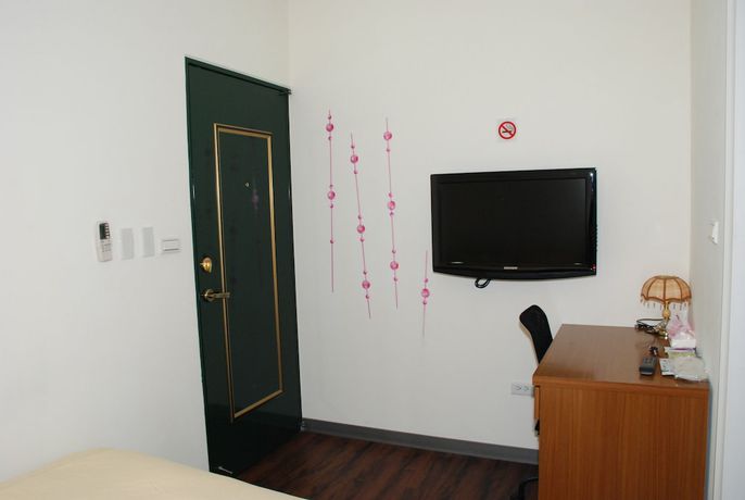 Imagen de la habitación del Hotel Come Inn Taipei. Foto 10