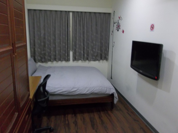 Imagen de la habitación del Hotel Come Inn Taipei. Foto 12