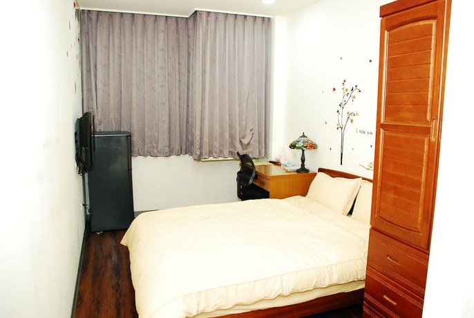 Imagen de la habitación del Hotel Come Inn Taipei. Foto 18