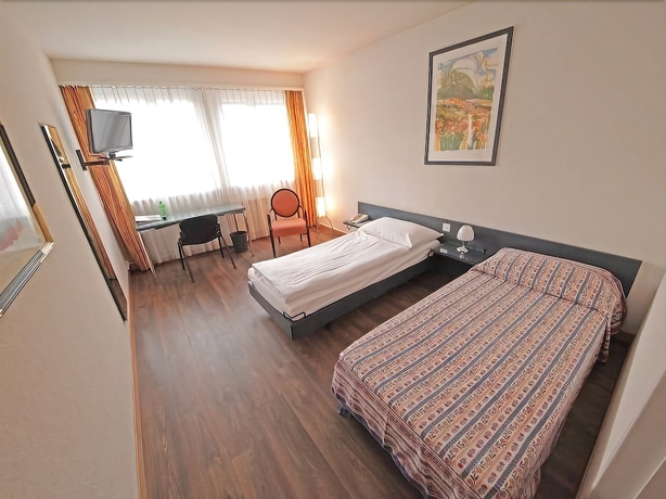 Imagen de la habitación del Hotel Comedie. Foto 8