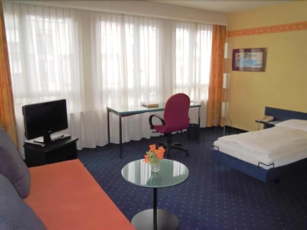 Imagen de la habitación del Hotel Comedie. Foto 13