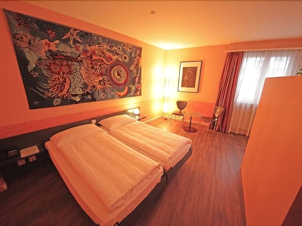 Imagen de la habitación del Hotel Comedie. Foto 15