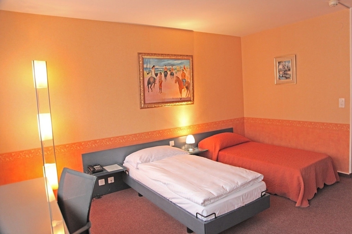 Imagen de la habitación del Hotel Comedie. Foto 17