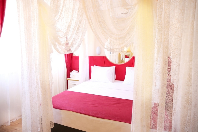 Imagen de la habitación del Hotel Comet Deluxe. Foto 12