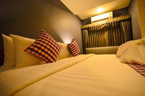 Imagen de la habitación del Hotel Comet Suratthani. Foto 8