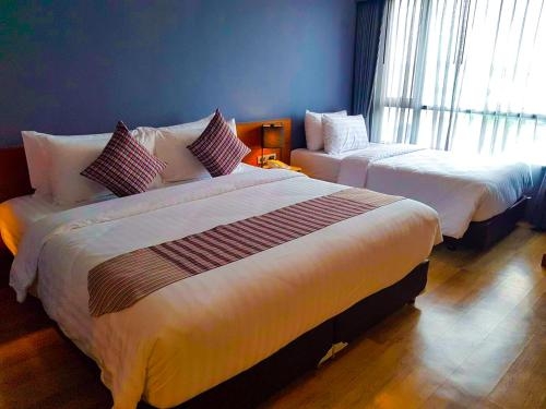 Imagen de la habitación del Hotel Comet Suratthani. Foto 9
