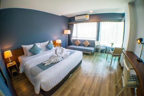 Imagen de la habitación del Hotel Comet Suratthani. Foto 10