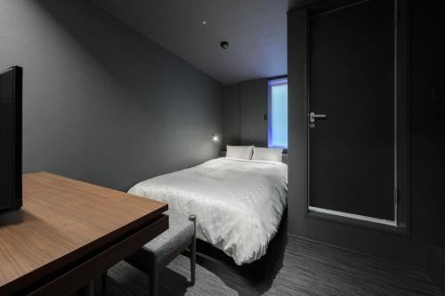 Imagen de la habitación del Hotel Comfact. Foto 8