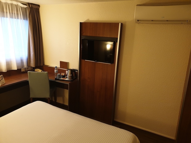 Imagen de la habitación del Hotel Comfort Aeroport Lyon St Exupery. Foto 7