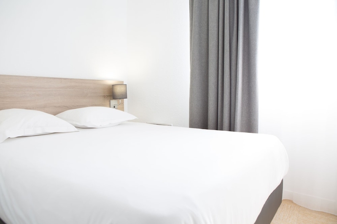 Imagen de la habitación del Hotel Comfort Aparthotel Divonne La Versoix. Foto 2