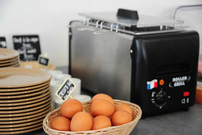 Imagen del bar/restaurante del Hotel Comfort Aparthotel Lourdes L'Acacia. Foto 5