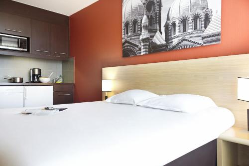 Imagen de la habitación del Hotel Comfort Aparthotel Marseille Prado. Foto 18