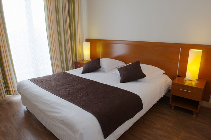 Imagen de la habitación del Hotel Comfort Aparthotel Saint-Nazaire Les Portes de l Ocean. Foto 8