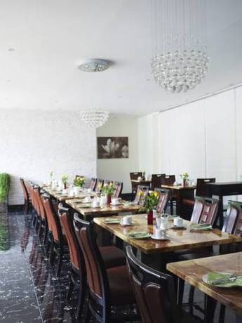 Imagen del bar/restaurante del Hotel Comfort Atlantic Muenchen Sued. Foto 2